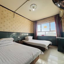 乌鲁木齐丰收宾馆(地窝堡国际机场北站东路店)
