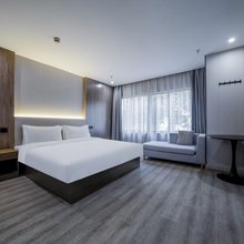 木柚酒店(下沙大学城文泽路地铁站店)