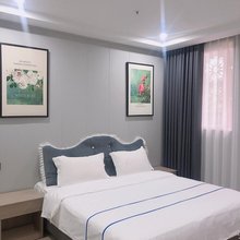 高旗假日酒店(重庆大坪医院地铁站店)