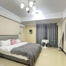 自然醒民宿(胖东来时代广场店)