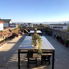 大理好彩民宿(洱海龙龛码头白木原婚纱馆店)