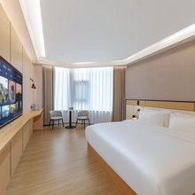 栖夕酒店(重庆冉家坝花卉园地铁站店)