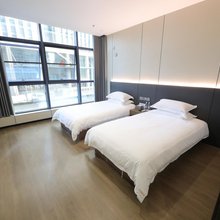 沐明宾馆(宝龙广场店)