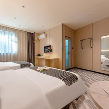 桔曼酒店(广州白云火车站西洲地铁站店)