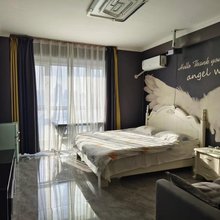 春天春公寓(哈尔滨国际会展中心盟科视界店)