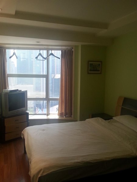 Fall in love with Chongqing Family Hotel Apartment Guest Room