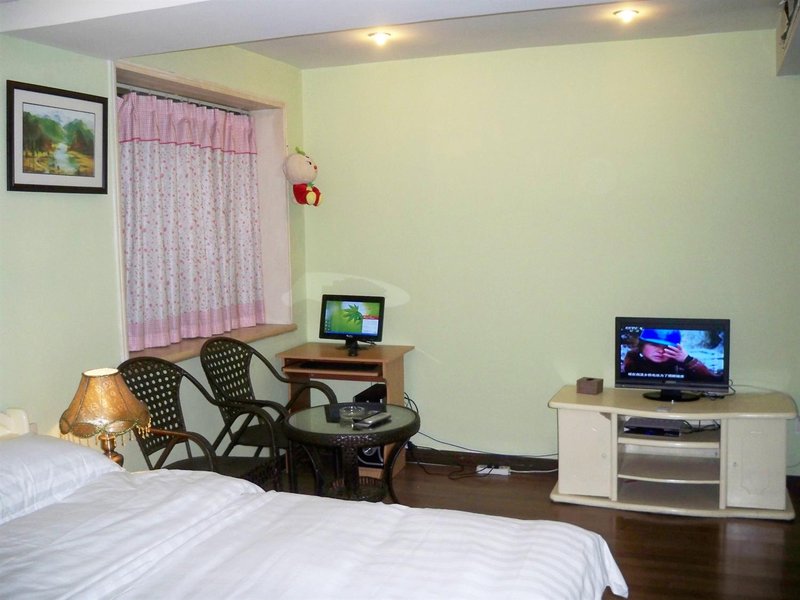 Fall in love with Chongqing Family Hotel Apartment Guest Room