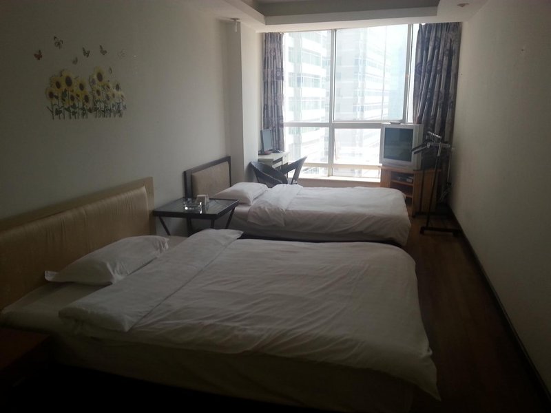 Fall in love with Chongqing Family Hotel Apartment Guest Room