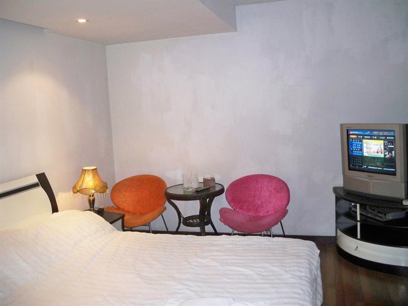 Fall in love with Chongqing Family Hotel Apartment Guest Room
