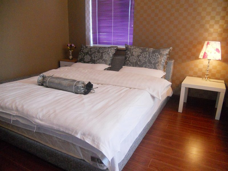 Xinghai Bi'an Apartment Hotel Guest Room