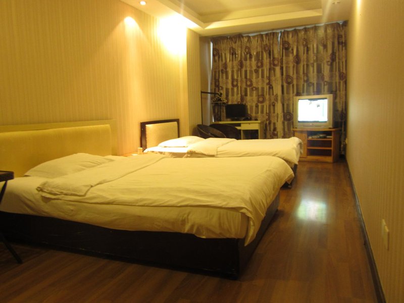 Fall in love with Chongqing Family Hotel Apartment Guest Room