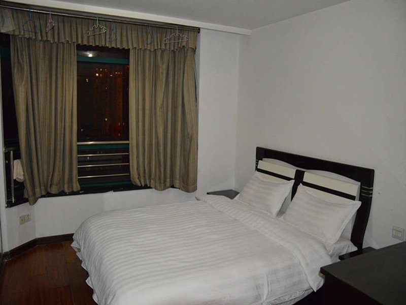 Yangguang Xingzuo Apartment Hotel Guest Room