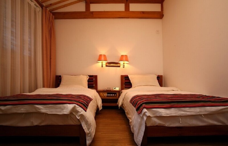 Dali Ancient Town Family Rainforest Inn Guest Room