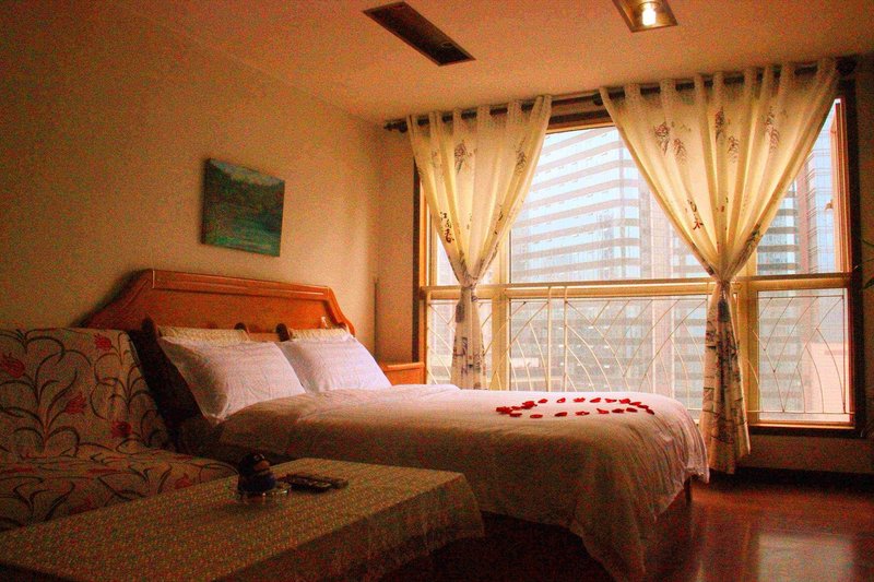 Yangguang Xingzuo Apartment Hotel Guest Room