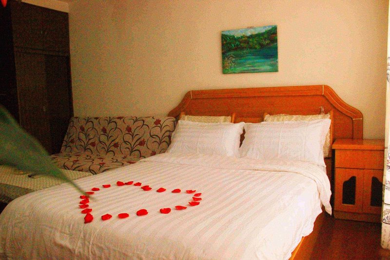 Yangguang Xingzuo Apartment Hotel Guest Room