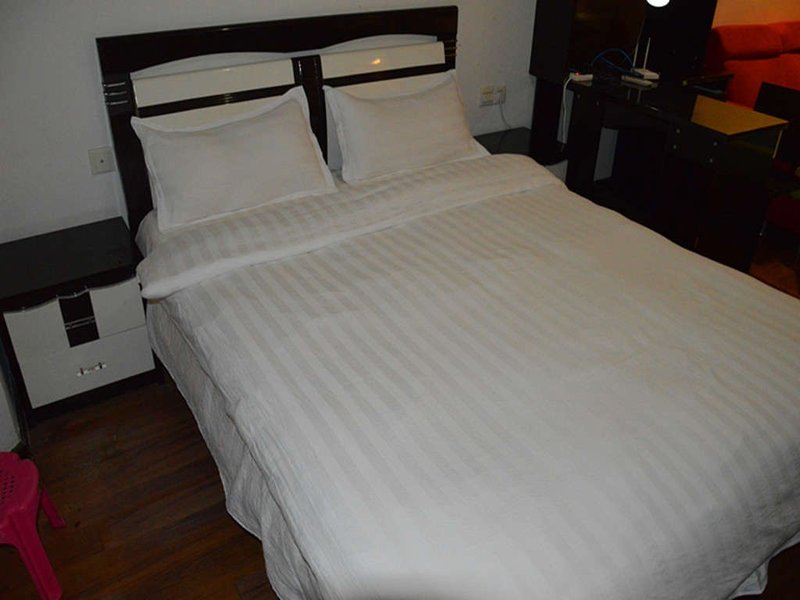 Yangguang Xingzuo Apartment Hotel Guest Room