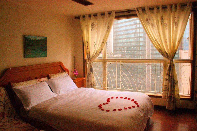 Yangguang Xingzuo Apartment Hotel Guest Room