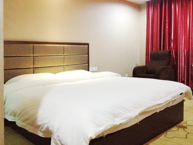 Junyi Chain Hoetl (Huanggang Wanda Plaza) Guest Room