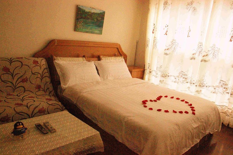 Yangguang Xingzuo Apartment Hotel Guest Room
