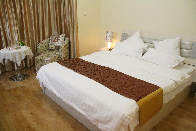 Xinyu Apartment Hotel (Changzhou Global Dinosaur City Wanda Plaza)Guest Room