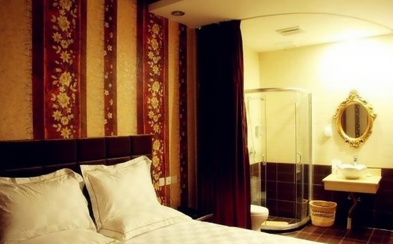 Wutong Qinglv Theme Hotel Guest Room