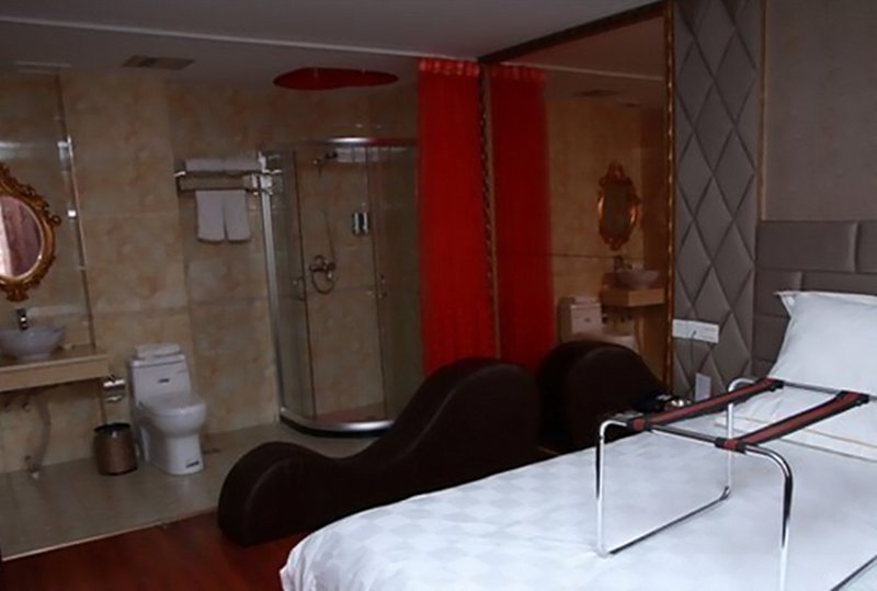 Wutong Qinglv Theme Hotel Guest Room