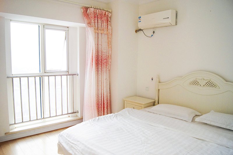 Sanxing Building Apartment Hotel Guest Room