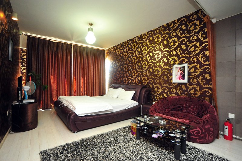 Yashe Shangpin Apartment Hotel Guest Room