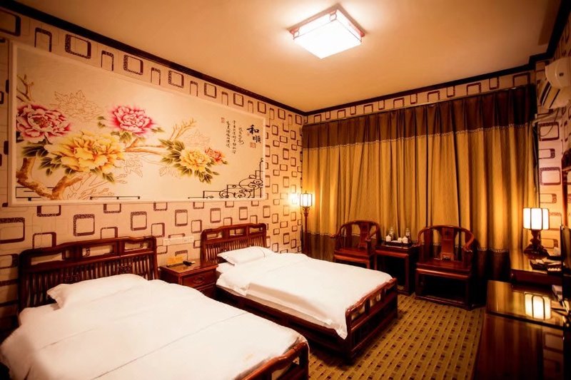 Yulong Hotel Guest Room