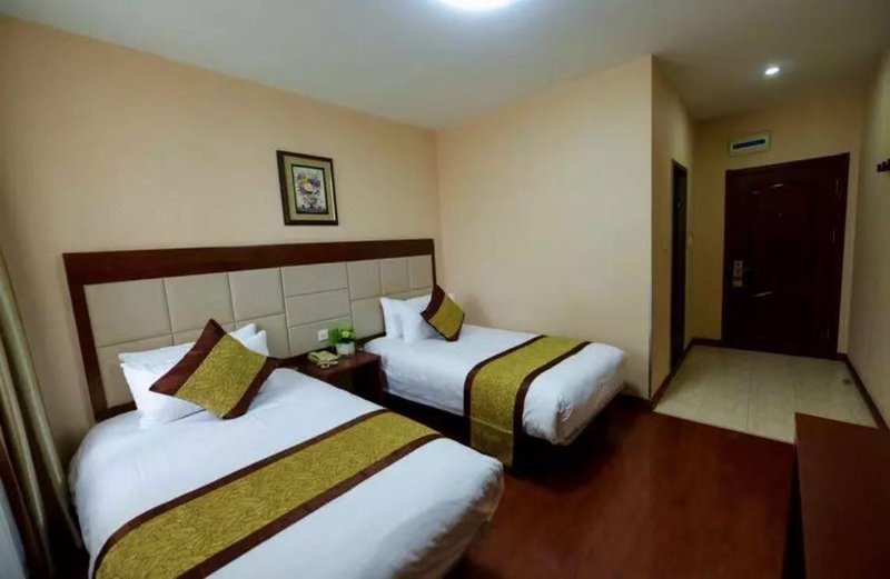 Riyueming Hotel (Dalian Railway Station Youhao Square) Guest Room