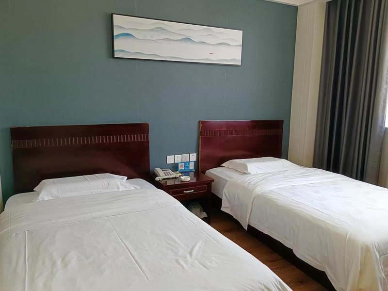 Nandu Hotel Guest Room