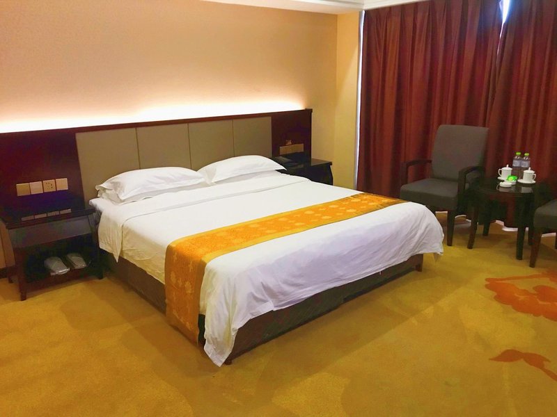 Buting Business Hotel Guest Room