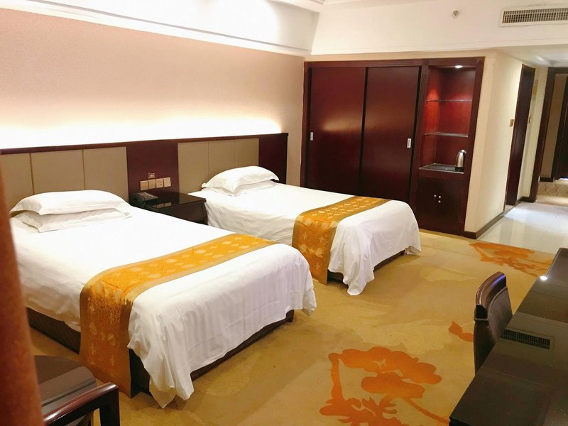 Buting Business Hotel Guest Room