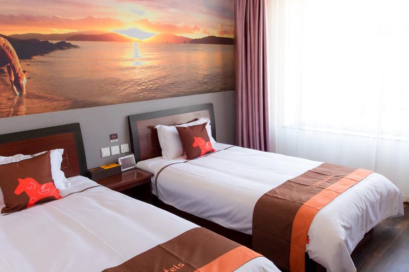 Junyi Chain Hotle (yantai passenger terminal TCM Hospital store) Guest Room