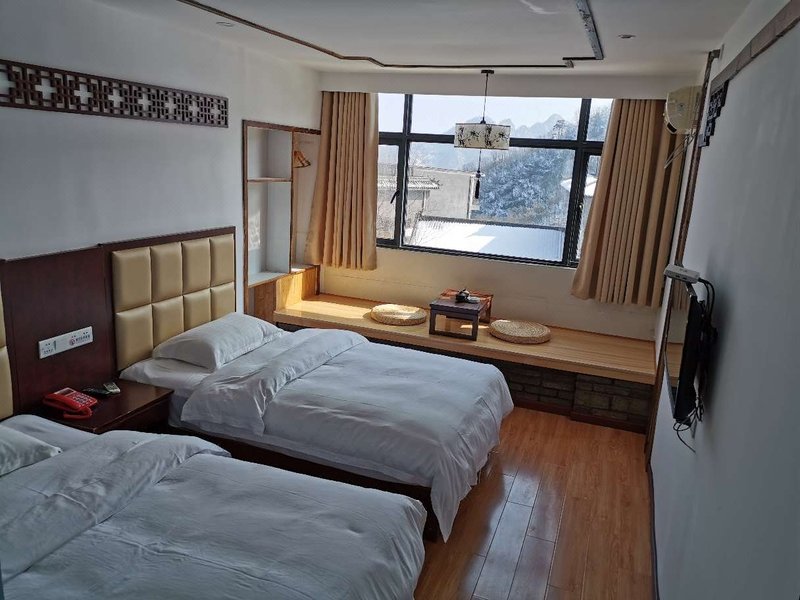 Yuannong Houdao Inn Guest Room