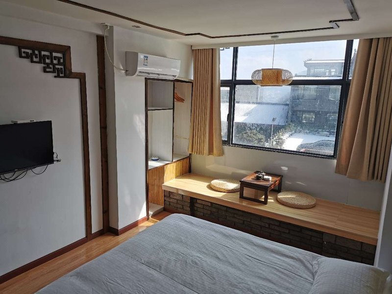 Yuannong Houdao Inn Guest Room