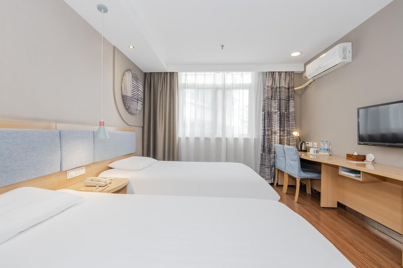 Home Inn (Xinchang Middle Jiangbin Road) Guest Room