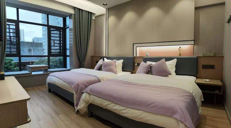Chunjiang Business Hechi Baima Street Guest Room