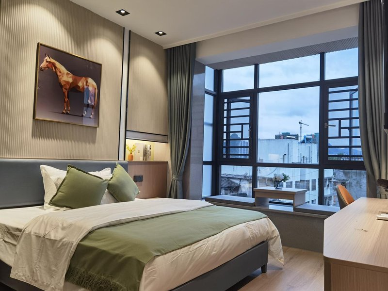 Chunjiang Business Hechi Baima Street Guest Room