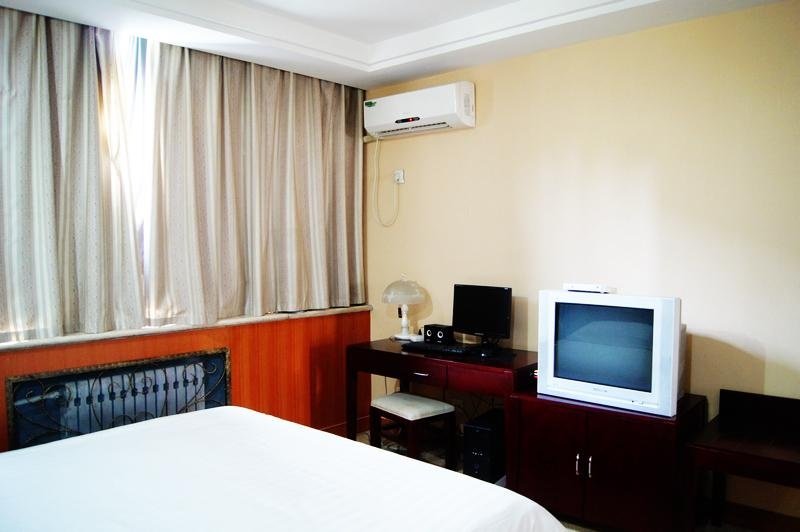 Ji'nan Qi Hua Business Hotel Guest Room