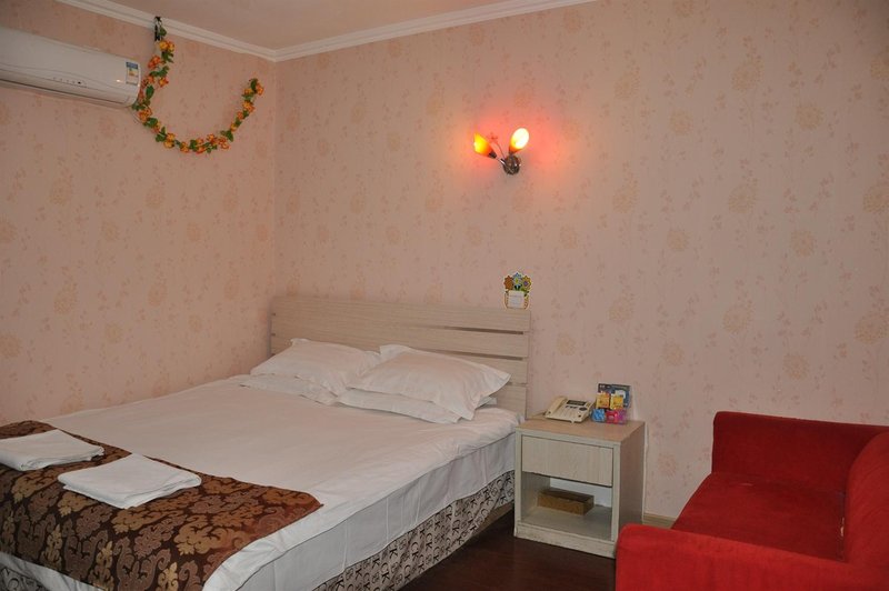 Qingdao love guest 100 business hotel Guest Room