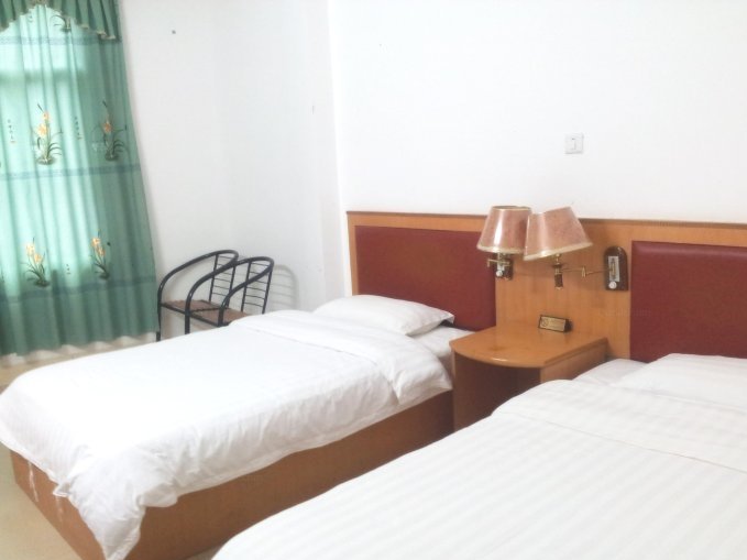 DaXin ShuoLong XinHua Hotel Guest Room