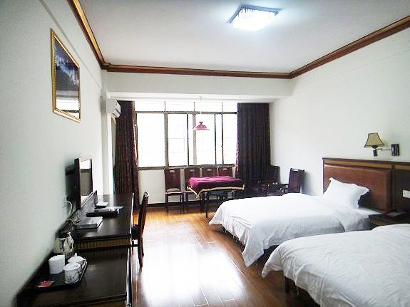 Xinhelong Hotel Guest Room