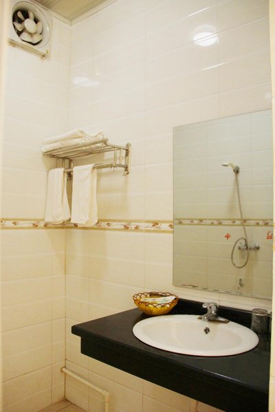 The League of nations Business Hotel Guest Room