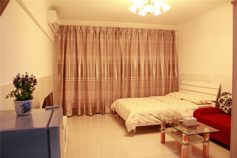 Xingfu Huafu Family ApartmentGuest Room