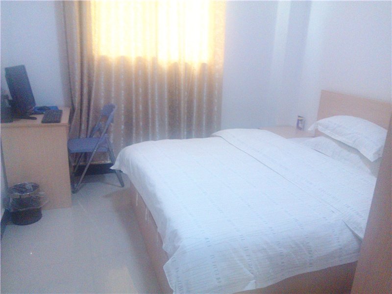 Qiangwei Jijie Apartment Guest Room