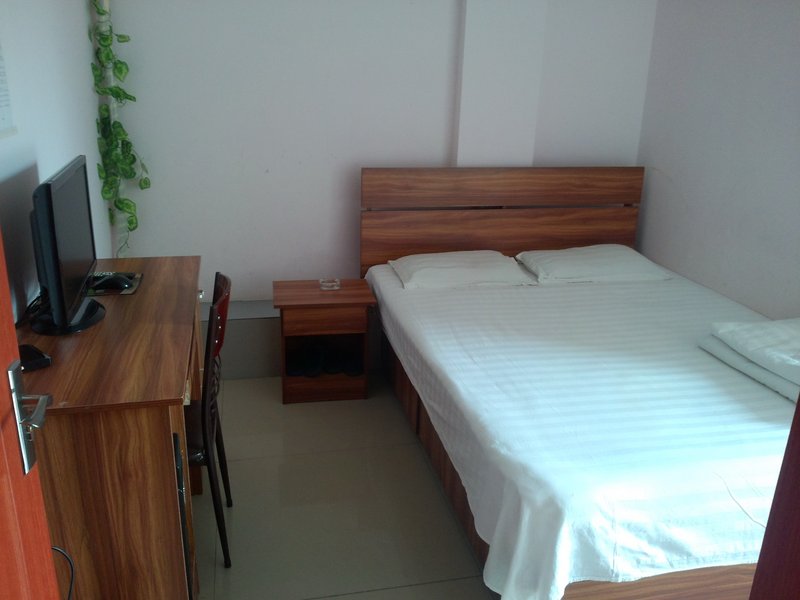 Longkou Donghai Xusheng HotelGuest Room