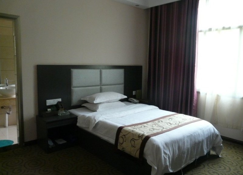 Shiqian Huangjiahua Holiday HotelGuest Room