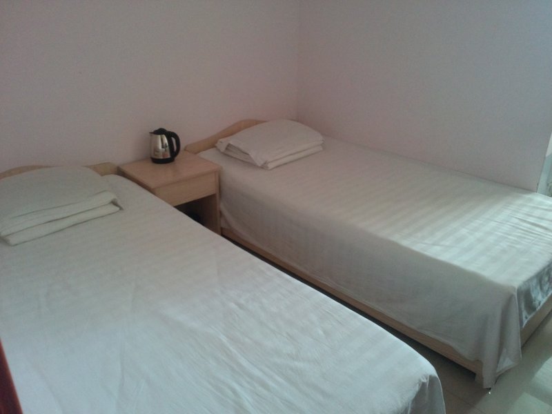 Longkou Donghai Xusheng HotelGuest Room