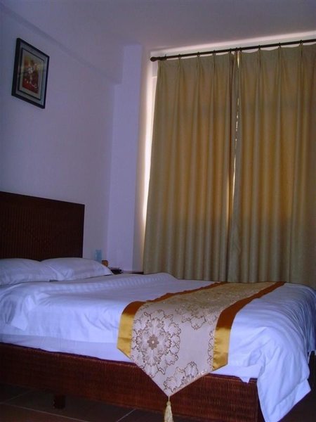 sanyajingchenghaijingdujiajiudianGuest Room